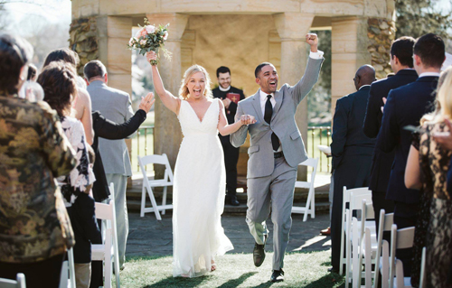 bride and groom cheering